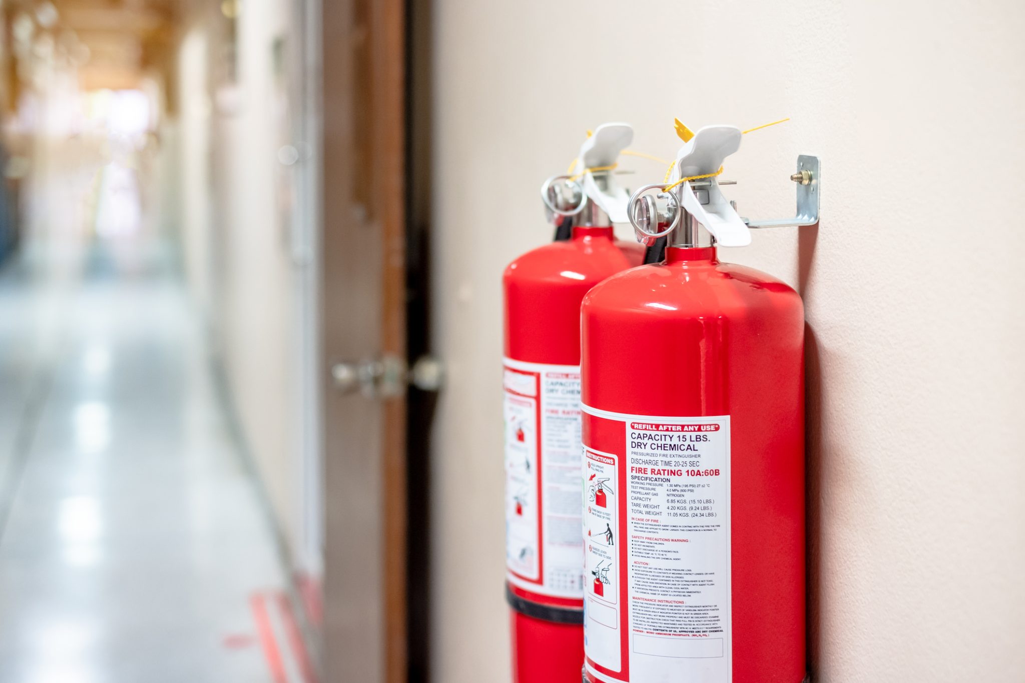 fire-extinguisher-system-on-the-wall-background-powerful-emergency-equipment-134008459